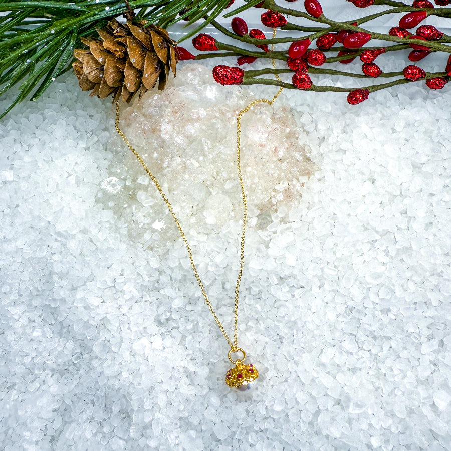 White Freshwater Pearl Necklace with Floral beadcap accented with pink CZ stones. 