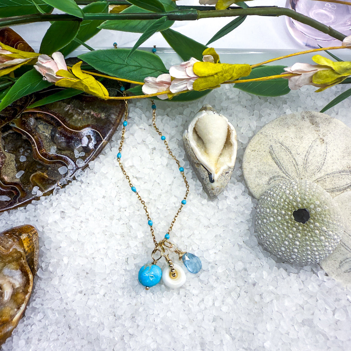 Turquoise, blue gemstone & shell charms on a beaded enamel vermeil chain.
