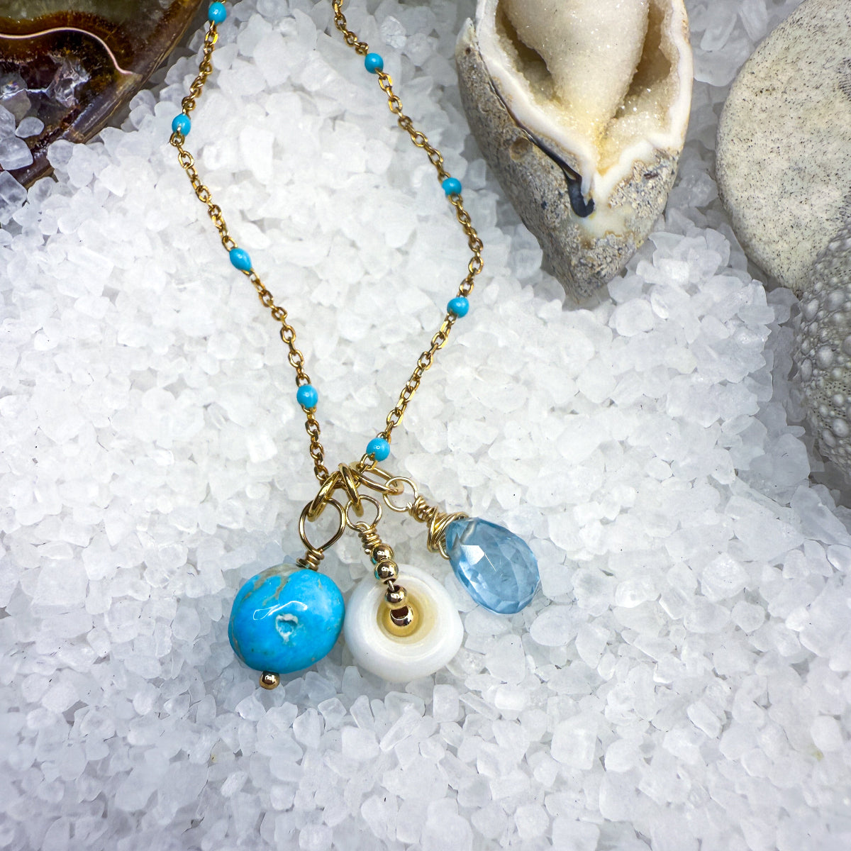 Turquoise, blue gemstone & shell charms on a beaded enamel vermeil chain.