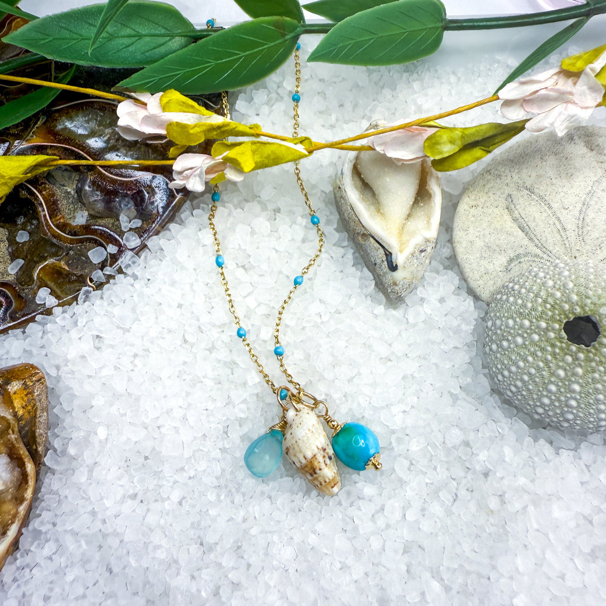 Turquoise, blue gemstone & shell charms on a beaded enamel vermeil chain.