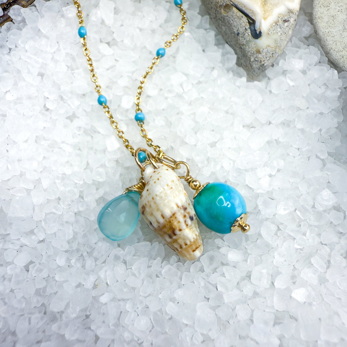 Turquoise, blue gemstone & shell charms on a beaded enamel vermeil chain.