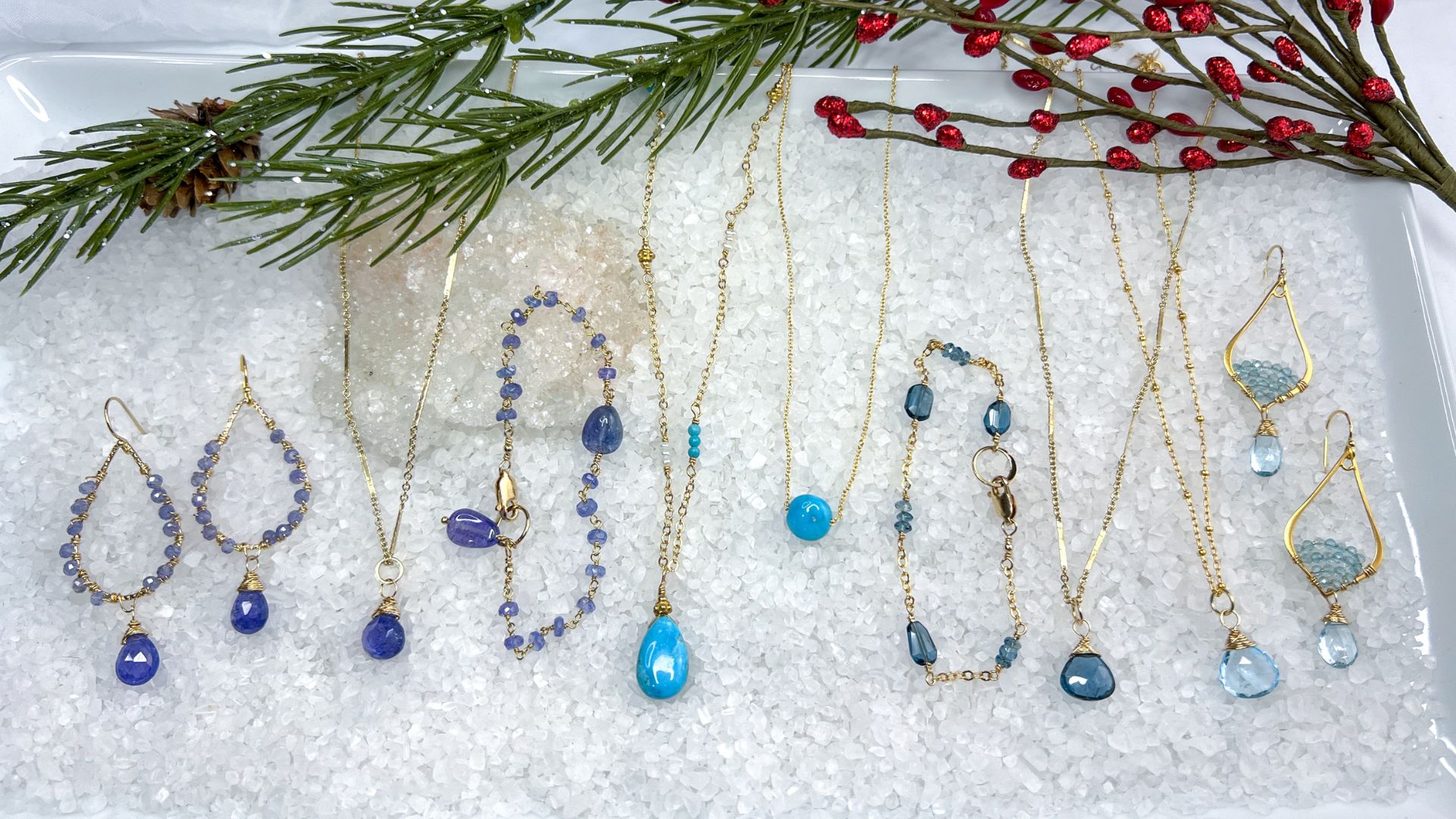 close-up of december birthstone jewelry featuring vibrant blue gemstones