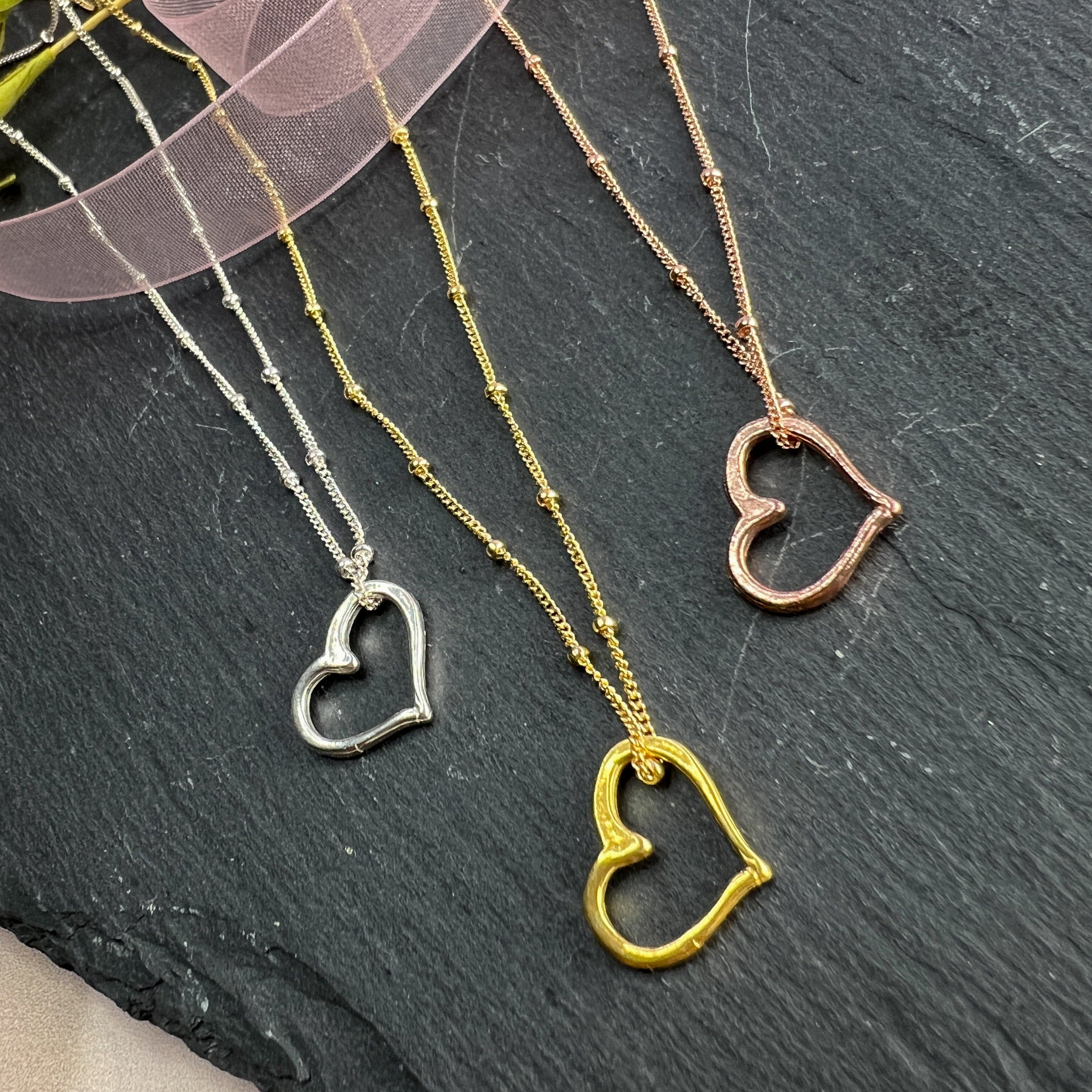 Amazon.com: Finejewelers 14K Yellow Gold Tri-Color 3 Floating Hearts  Pendant Necklace on a 17 Inch Chain : Clothing, Shoes & Jewelry